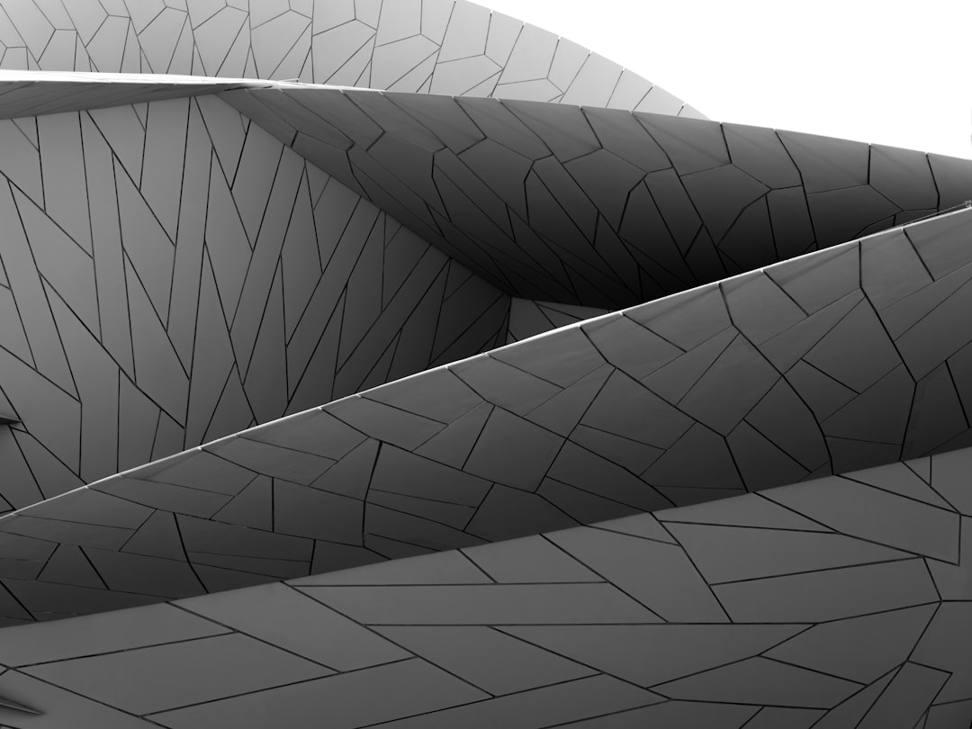 Abstract architectural structure with geometric patterns.