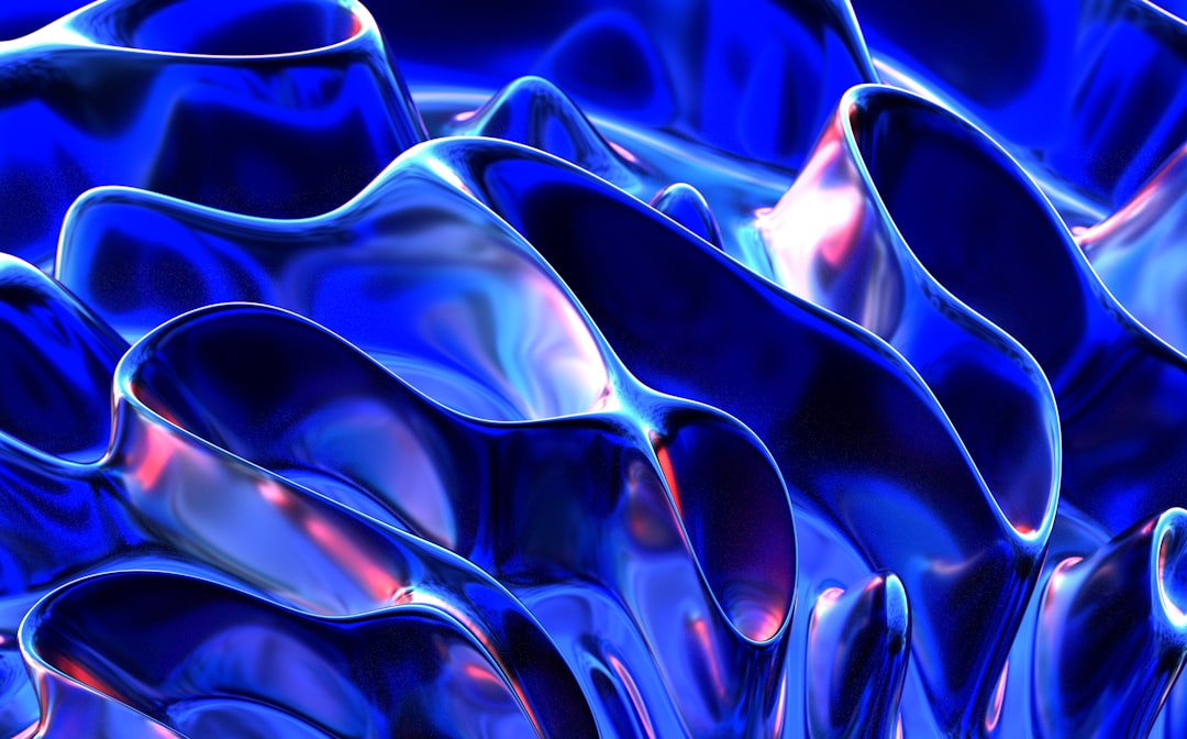 Abstract blue and purple fluid shapes.