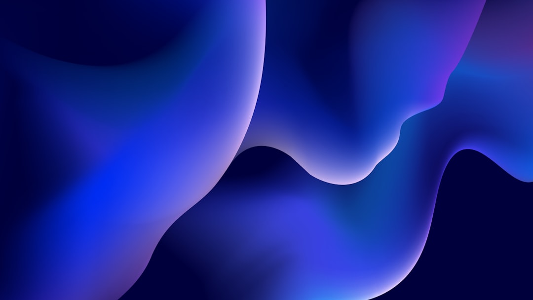 Abstract blue and purple gradient shapes.