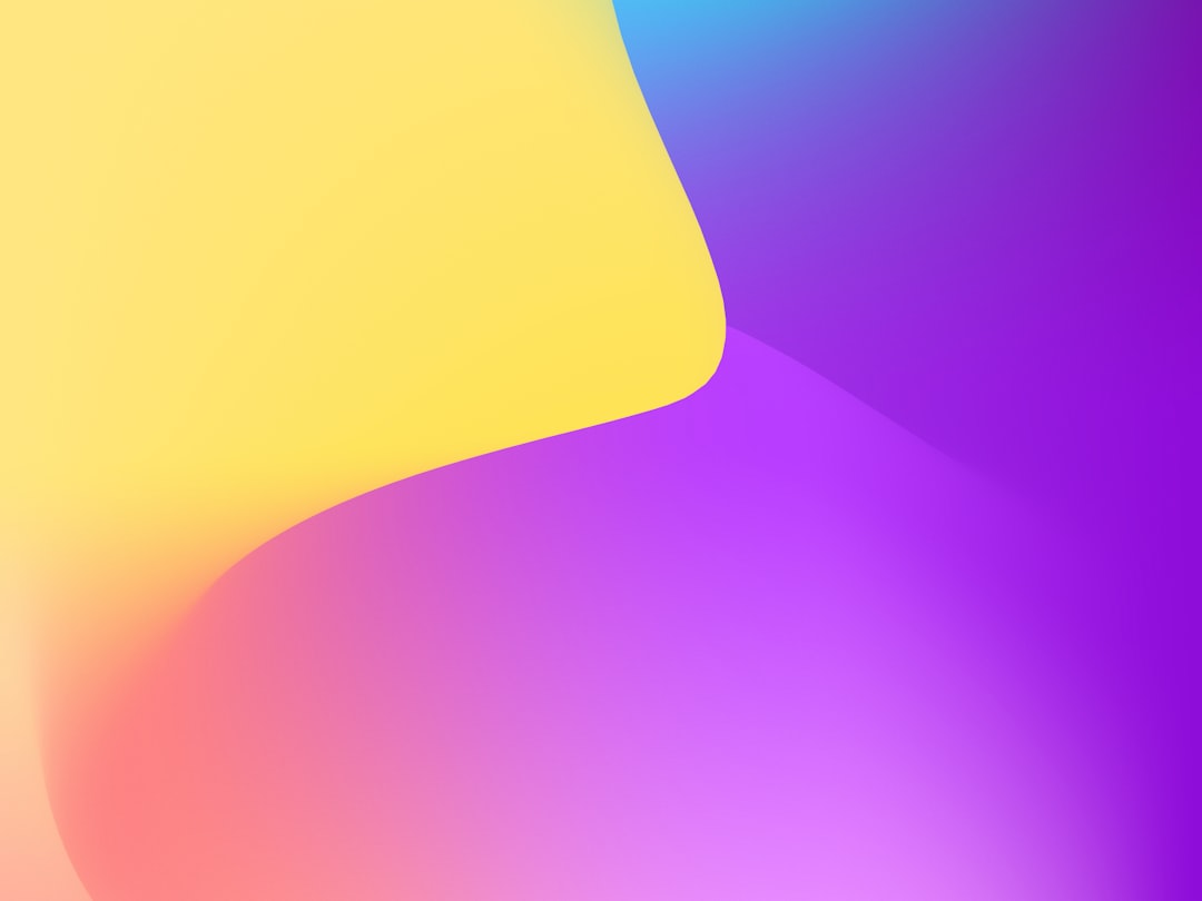 Abstract gradient with yellow and purple hues.