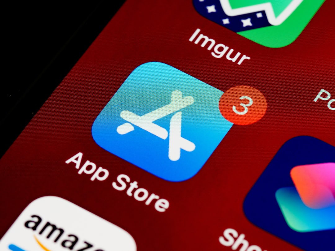 App Store icon with notification badge on a smartphone screen.