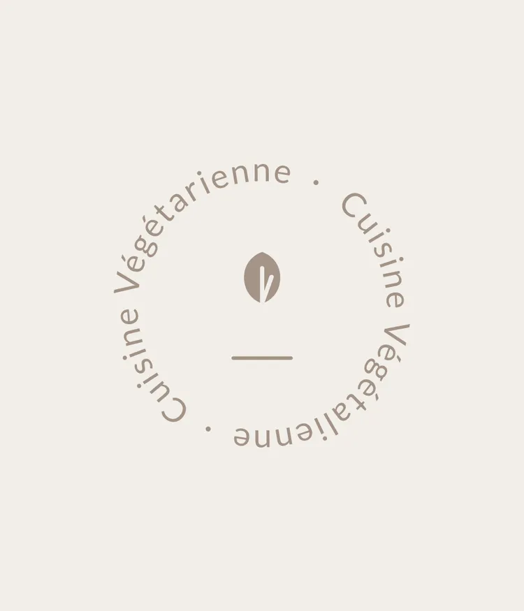 Circular logo with text 'Cuisine Végétarienne' and a leaf symbol in the center.