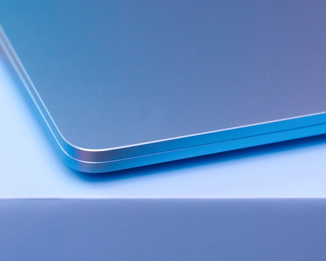 Close-up of a sleek laptop corner.