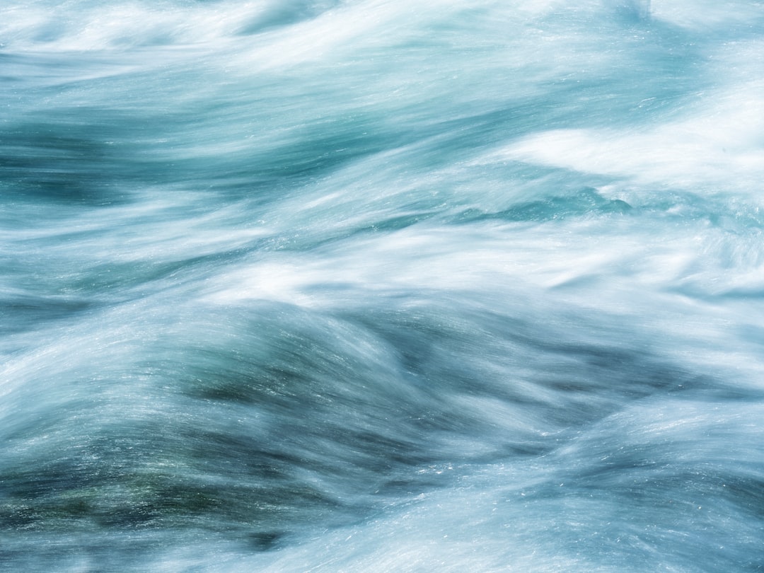 Flowing water with a smooth, blurred effect.