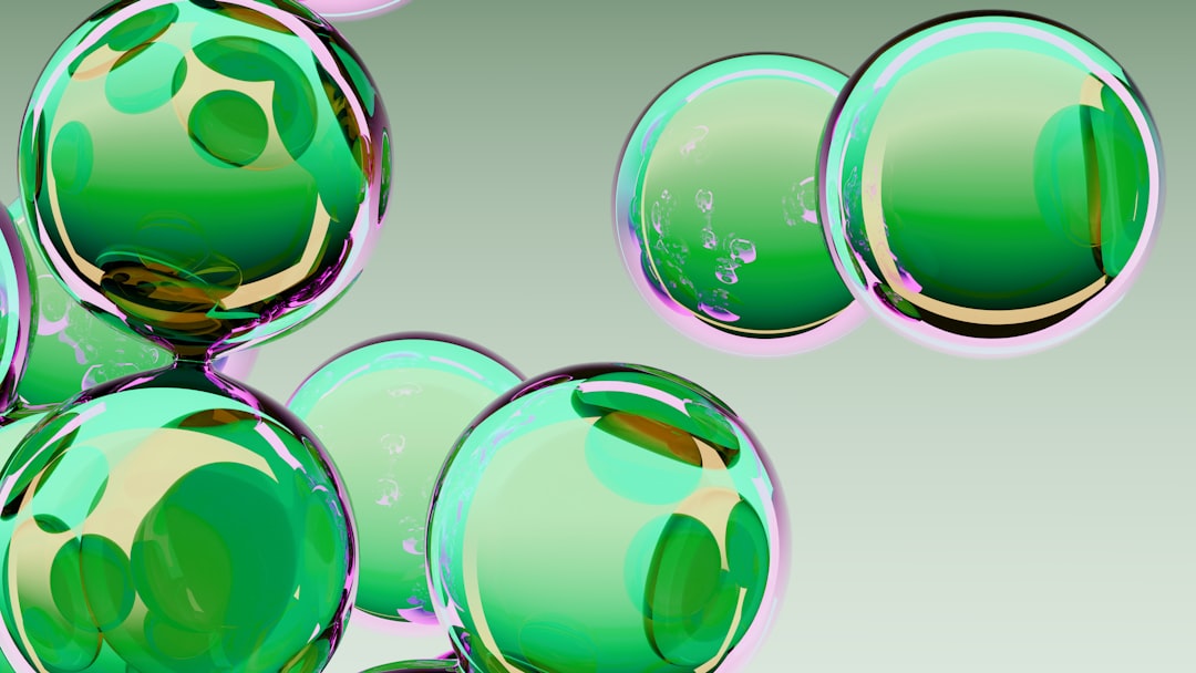 Green translucent bubbles floating against a gradient background.