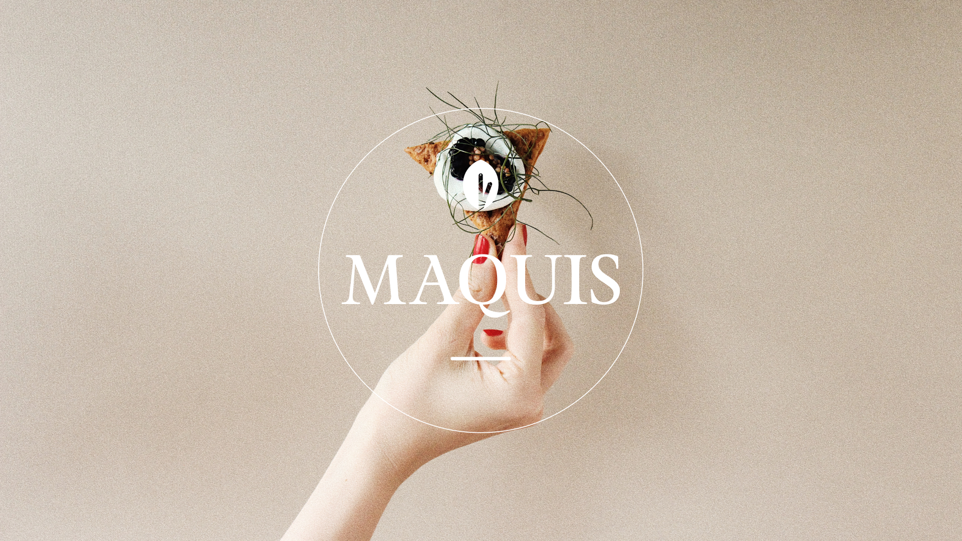 Hand holding a small appetizer with the word 'MAQUIS' overlaid.