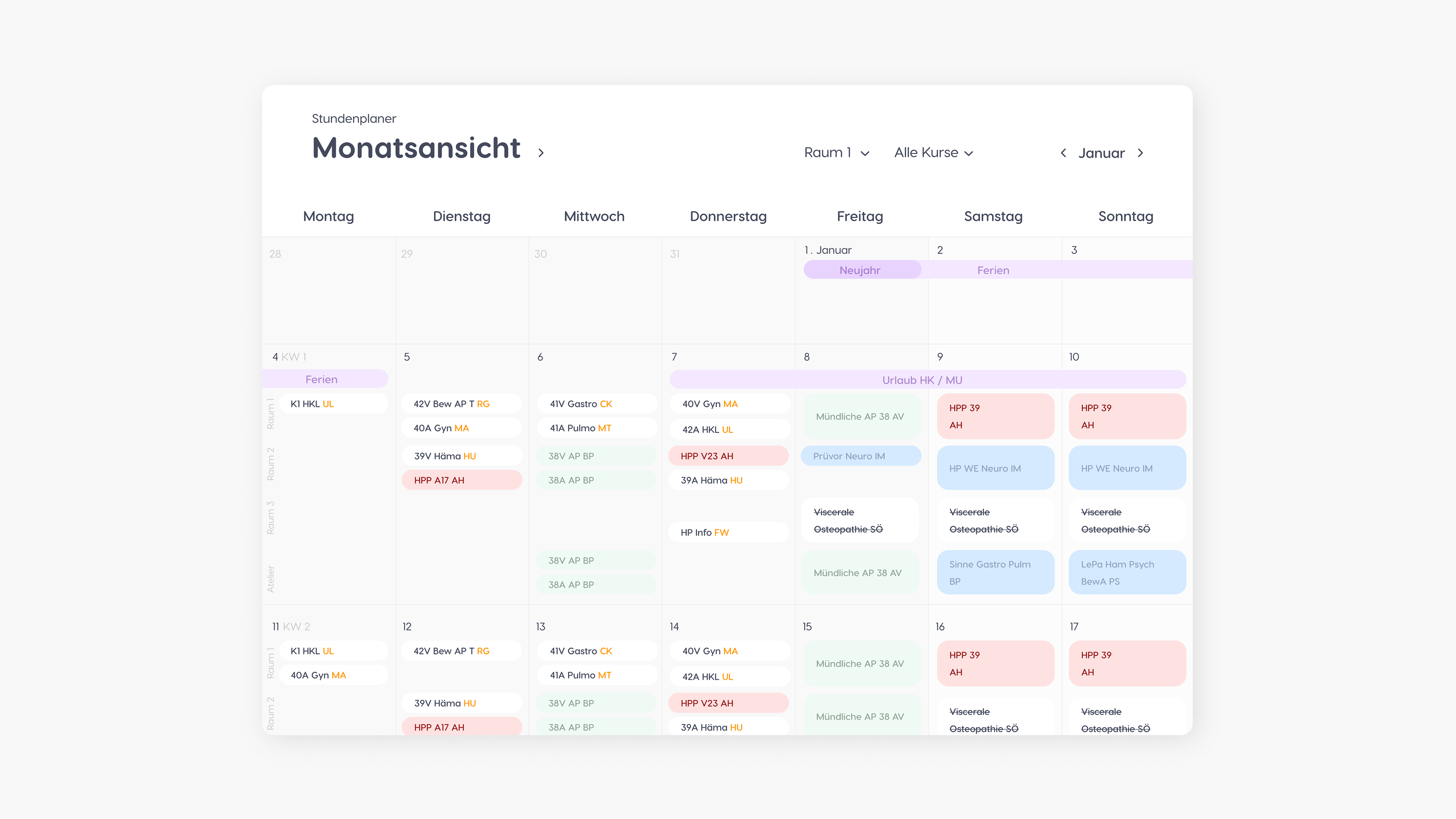 Monthly planner calendar with various colored entries.