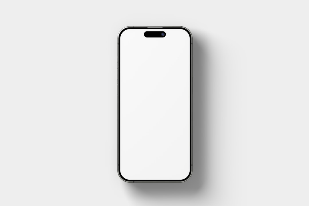 Smartphone with a blank screen on a light background.