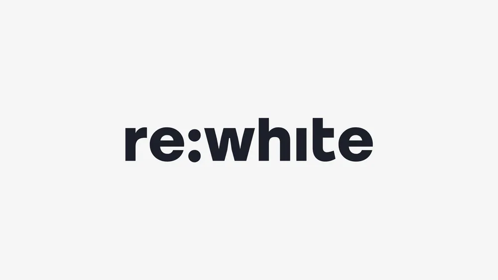 The word 're:white' in bold black text on a white background.